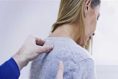 What can cause back pain in a woman?