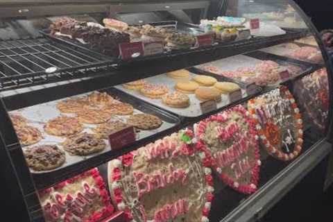 Woman slams 10-year-old''s head into cookie display at Troy mall